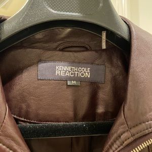 Kenneth Cole reaction jacket.  Burgundy color.  Some fabric on sleeves.